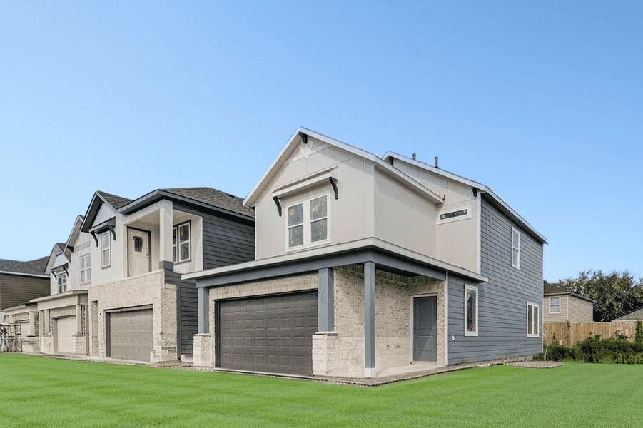 Representative exterior photo of a completed home built from the June by Saratoga Homes in Eagle Landing, Houston, TX (Image 1). Representative exterior photo of a completed home built from the June by Saratoga Homes in Eagle Landing, Houston, TX (Image 1).