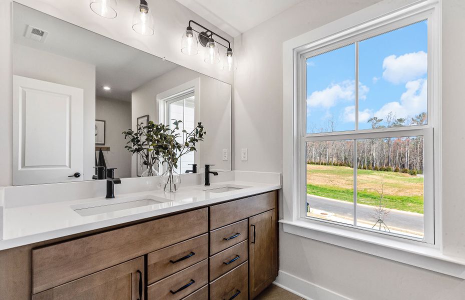 Representative furnished interior of a home built from the Woodward by Pulte Homes in Riversprings, Dacula (Image 6).