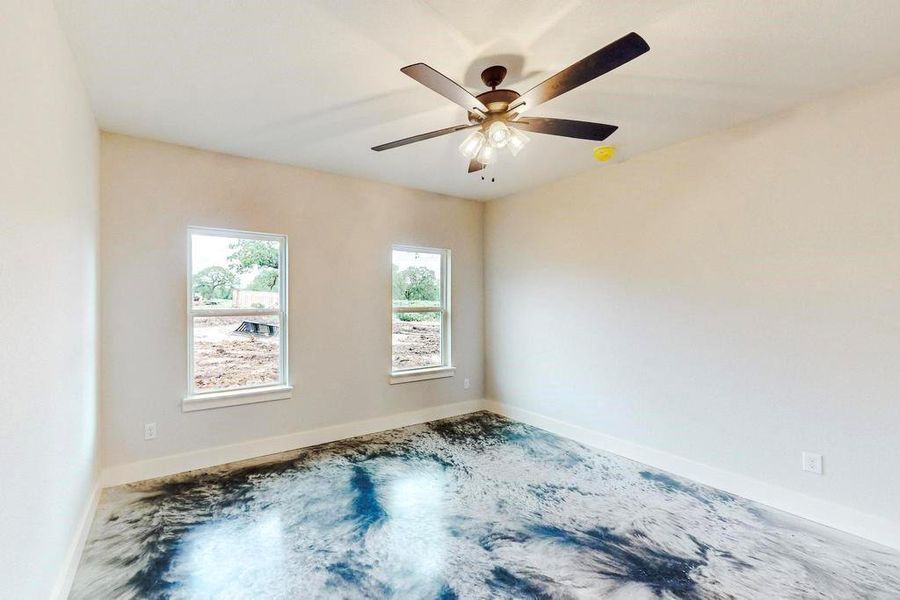 Unfurnished room with ceiling fan