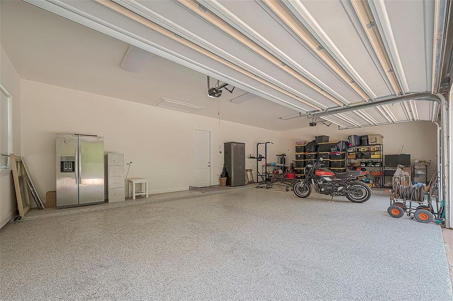 Extra large 3-car garage with /polyurea/polyaspartic concrete floor coating