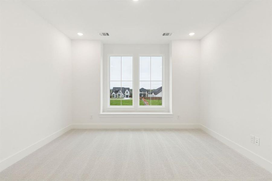 Just off the gameroom, the kiddos will enjoy their own office space. Just off the gameroom, the kiddos will enjoy their own office space.