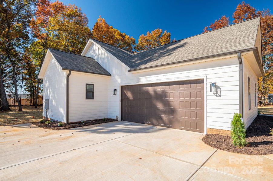Front exterior of a new home in , Newton, NC, highlighting curb appeal (Image 21).