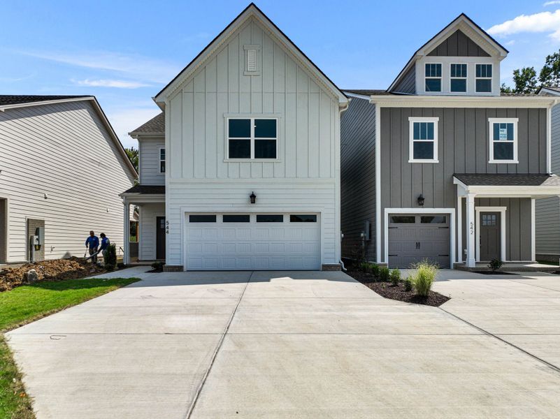 Front exterior of a home in the The Village at Bonnie Oaks community, located in Lebanon, TN (Image 9).