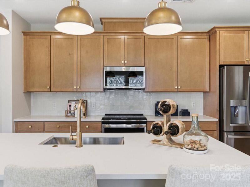 Modern Stained Cabinetry. *Model Photos | Actual Finishes, Structural Selections, and Orientation May Vary.