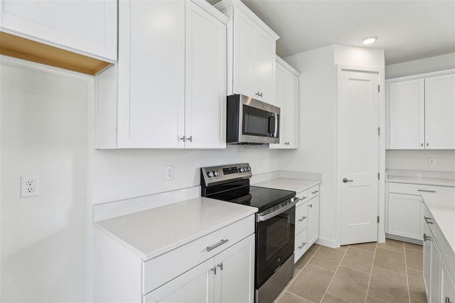 Furnished interior view inside a new home in Trinity Place, St. Cloud (Image 13). Furnished interior view inside a new home in Trinity Place, St. Cloud (Image 13).
