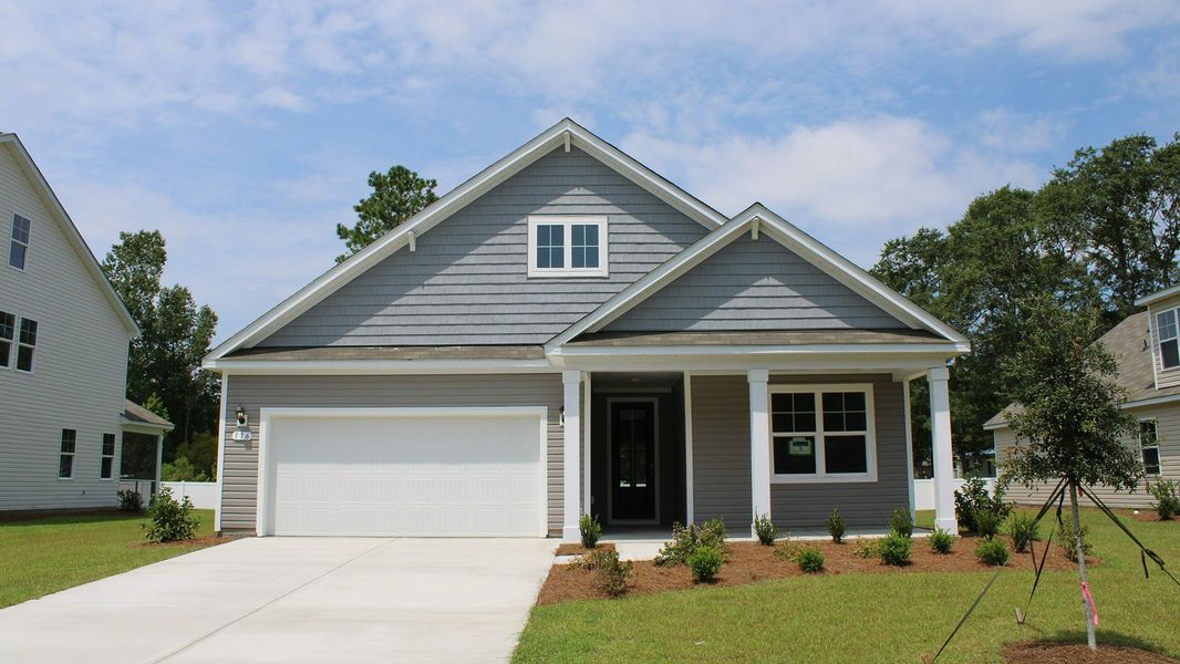 Representative exterior photo of a completed home built from the LITCHFIELD by D.R. Horton in Spring View Landing, Loris, SC (Image 1).