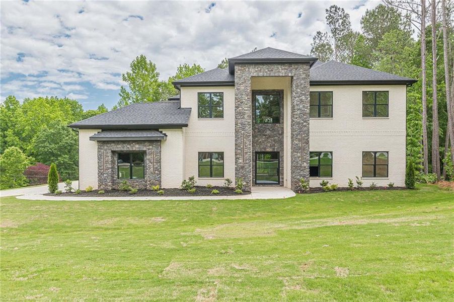 Front exterior of a new home in , McDonough, GA, highlighting curb appeal (Image 32).