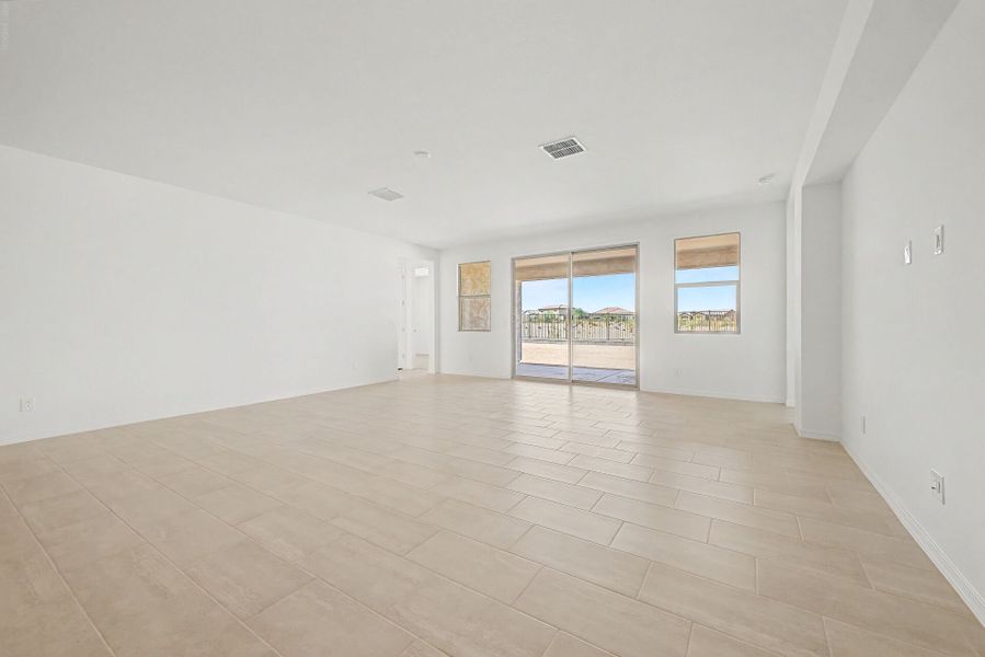 Spacious, unfurnished interior of a new home in White Tank Vistas, Waddell (Image 9). Spacious, unfurnished interior of a new home in White Tank Vistas, Waddell (Image 9).
