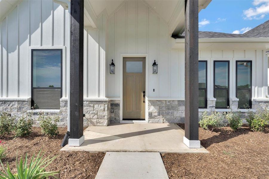 Exterior details and patio area of a home in , Azle (Image 1).
