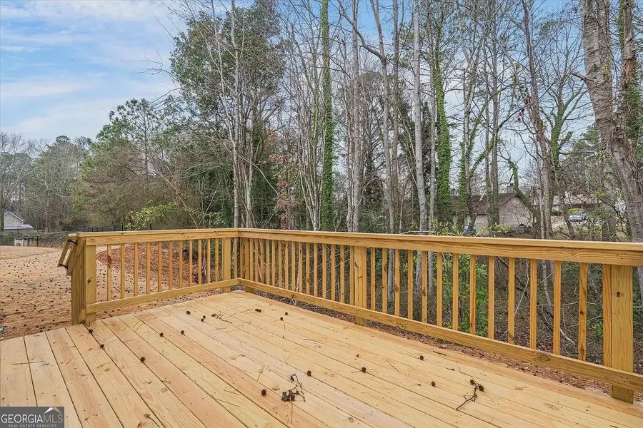 Exterior details and patio area of a home in Canterbury Villas, Carrollton (Image 3).