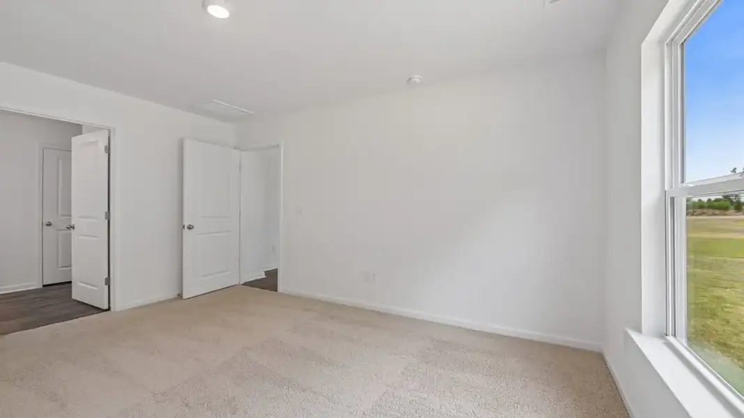 Spacious, unfurnished interior of a new home in Wilson's Ridge, Wilson's Mills (Image 27).