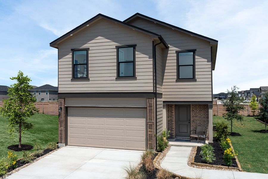 Representative exterior photo of a completed home built from the Plan 2088 Modeled by KB Home in Preserve at Culebra - Heritage Collection, San Antonio, TX (Image 11). Representative exterior photo of a completed home built from the Plan 2088 Modeled by KB Home in Preserve at Culebra - Heritage Collection, San Antonio, TX (Image 11).