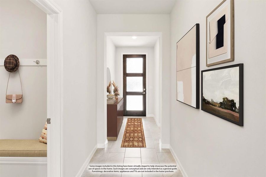 Entryway hallway with tile floors, runner rug, glass front door, and mudroom with bench and coat hooks