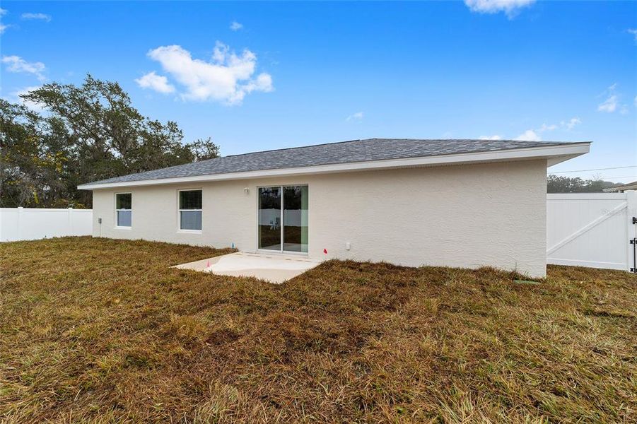 Exterior details and patio area of a home in , Ocala (Image 3).