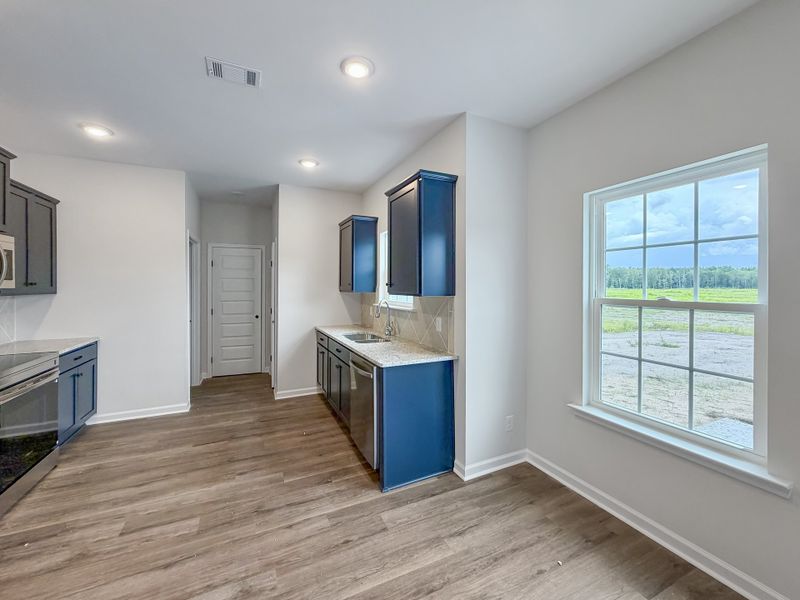 Furnished interior view inside a new home in Tranquil South, Hinesville (Image 7).