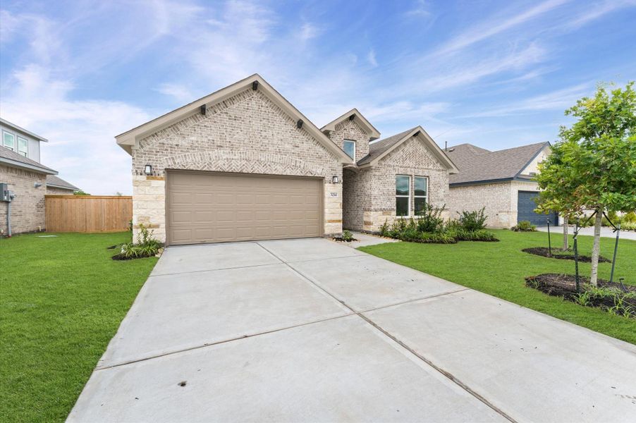 Front exterior of a new home in , Angleton, TX, highlighting curb appeal (Image 2). Front exterior of a new home in , Angleton, TX, highlighting curb appeal (Image 2).