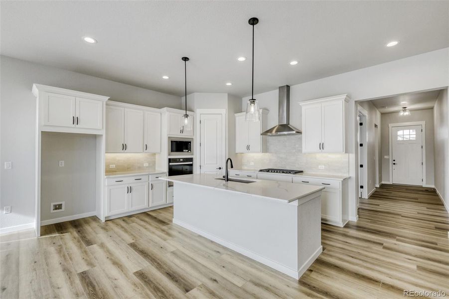 Furnished interior view inside a new home in Sterling Ranch Homestead, Colorado Springs (Image 9).