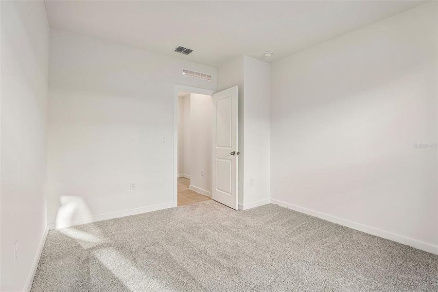 Spacious, unfurnished interior of a new home in Cyrene at Harmony, St. Cloud (Image 14).