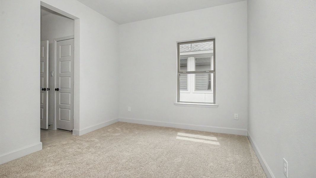 Spacious, unfurnished interior of a new home in Legacy Prairie at Katy Court, Katy (Image 15).