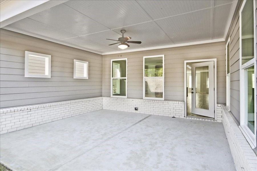 Exterior details and patio area of a home in Cooper's Walk, Loganville (Image 4).