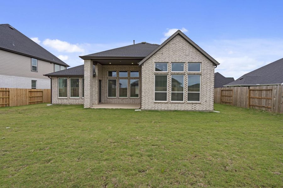 Exterior details and patio area of a home in Attwater 55s, Waller (Image 3).