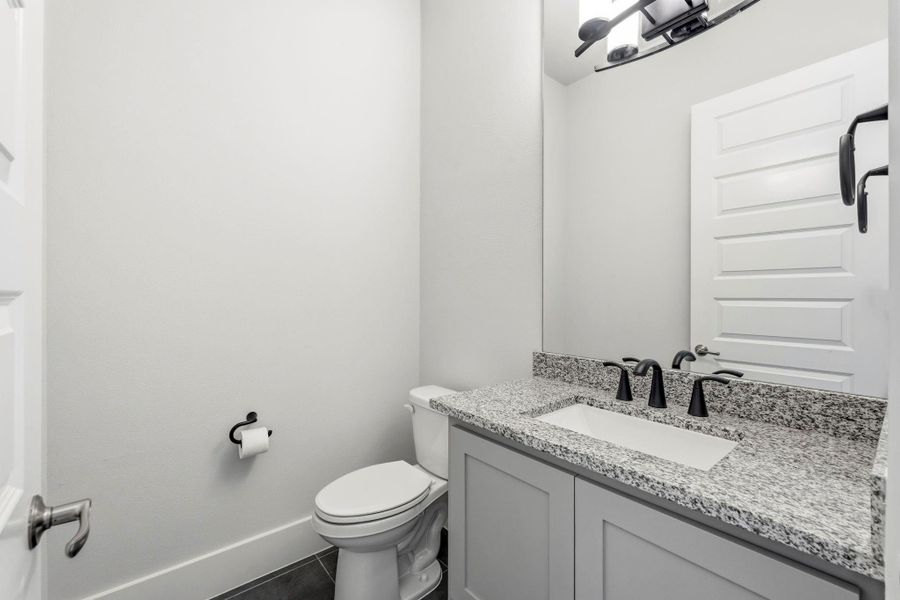 Half bath next to game room Half bath next to game room