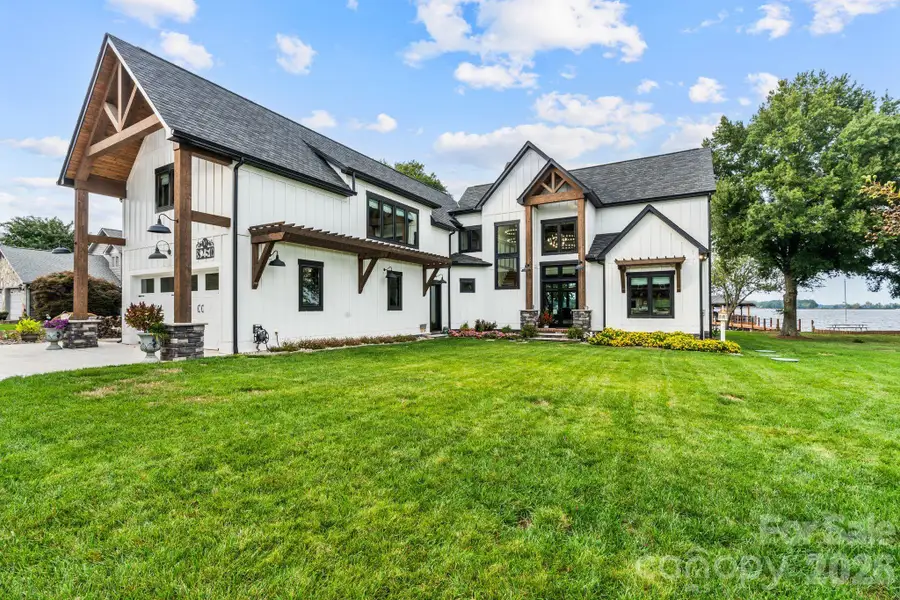 Finished 3-car garage features epoxy floors, utility room and direct access to the bonus room Finished 3-car garage features epoxy floors, utility room and direct access to the bonus room