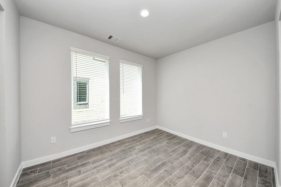 Make memories gathered around the table with your family and friends! This spacious dining room features elegant flooring, custom paint, and adjacent to family room and kitchen for open concept feel. Sample photo of completed home with similar floor plan. Actual colors and selections may vary. Make memories gathered around the table with your family and friends! This spacious dining room features elegant flooring, custom paint, and adjacent to family room and kitchen for open concept feel. Sample photo of completed home with similar floor plan. Actual colors and selections may vary.