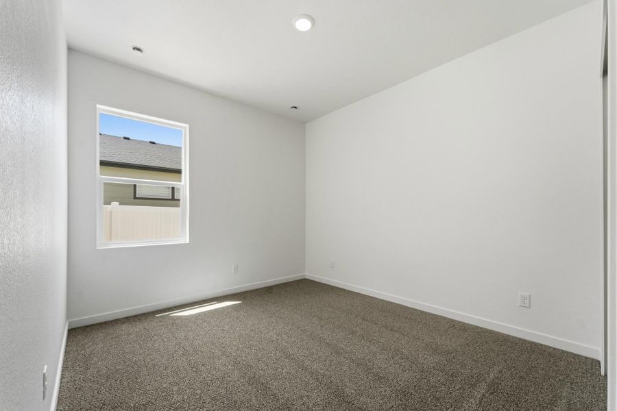 Spacious, unfurnished interior of a new home in Union Colony West, Greeley (Image 47).