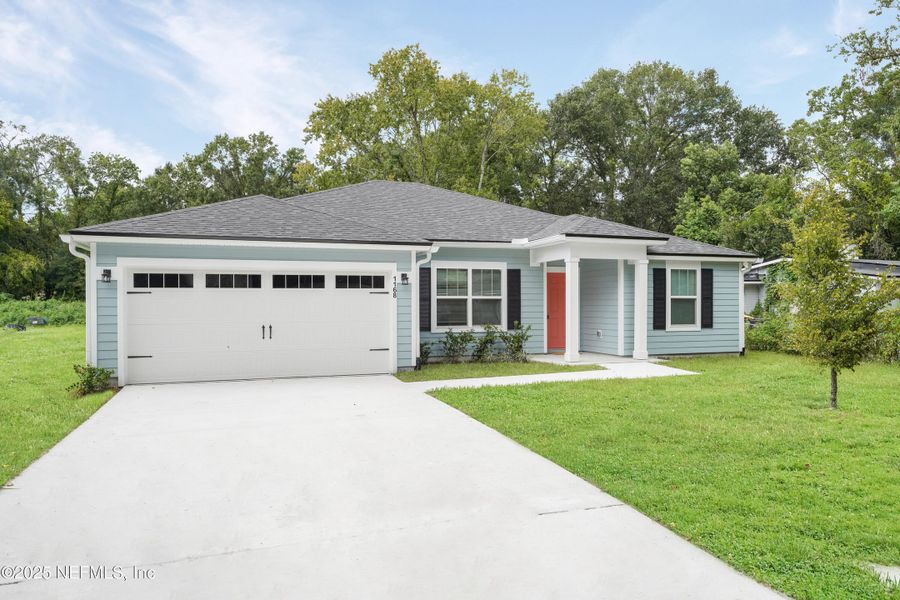 Front exterior of a new home in , Jacksonville, FL, highlighting curb appeal (Image 20).