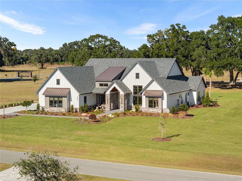 Front exterior of a new home in , Archer, FL, highlighting curb appeal (Image 16).