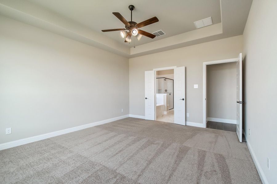 Primary Bedroom | Concept 2199 at Massey Meadows in Midlothian, TX by Landsea Homes