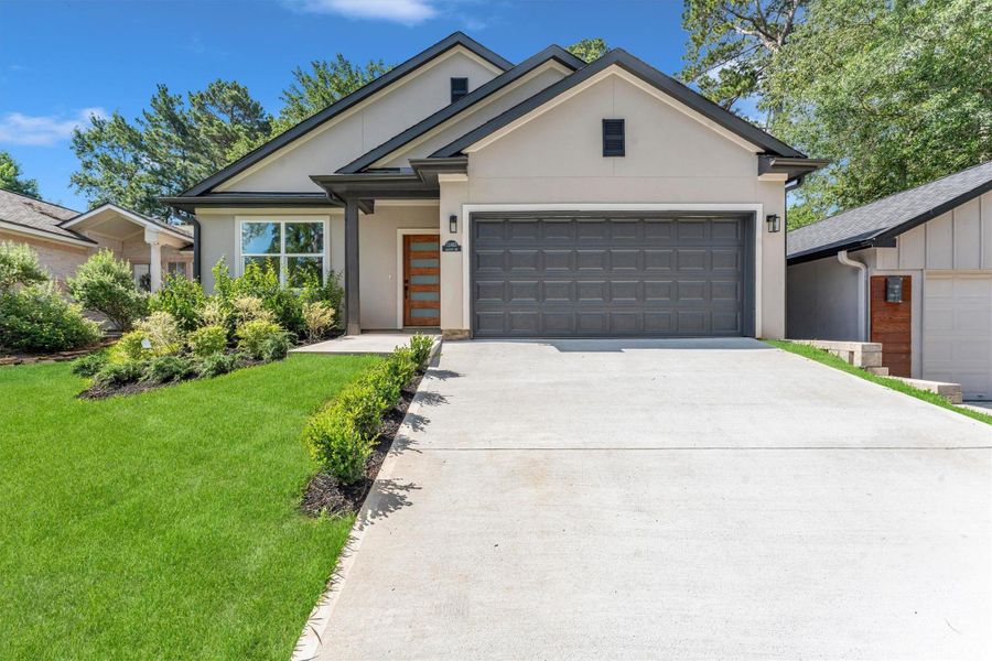 Front exterior of a new home in , Montgomery, TX, highlighting curb appeal (Image 27). Front exterior of a new home in , Montgomery, TX, highlighting curb appeal (Image 27).