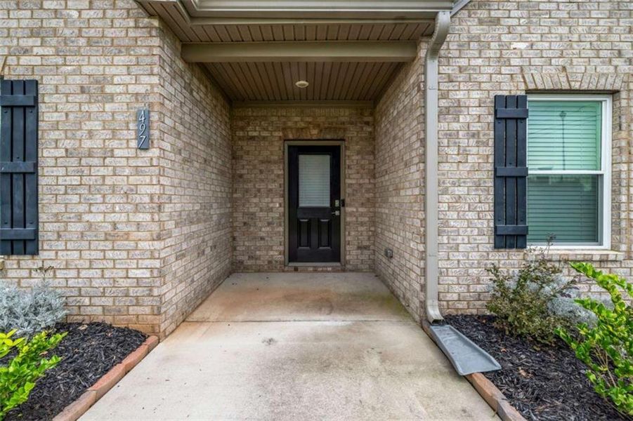 Front exterior of a new home in Palmetto Oaks Phase III, Palmetto, GA, highlighting curb appeal (Image 21). Front exterior of a new home in Palmetto Oaks Phase III, Palmetto, GA, highlighting curb appeal (Image 21).