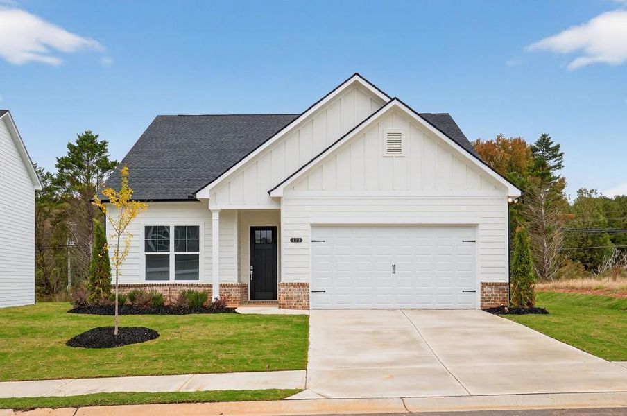 Front exterior of a new home in Red Bird Manor, Jefferson, GA, highlighting curb appeal (Image 1). Front exterior of a new home in Red Bird Manor, Jefferson, GA, highlighting curb appeal (Image 1).
