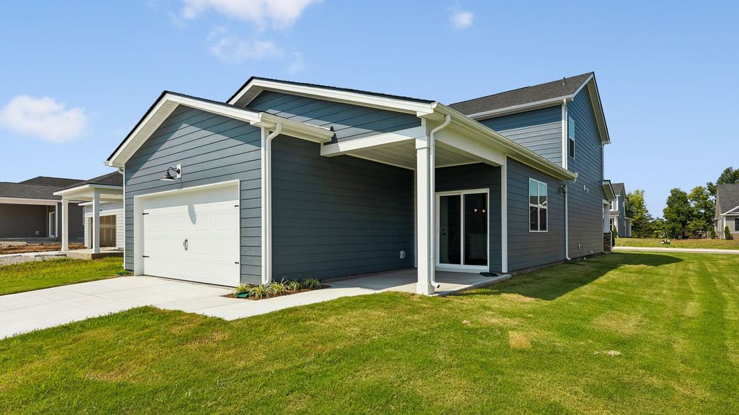 Exterior details and patio area of a home in Reserve at Hickory Ridge, Columbia (Image 29).