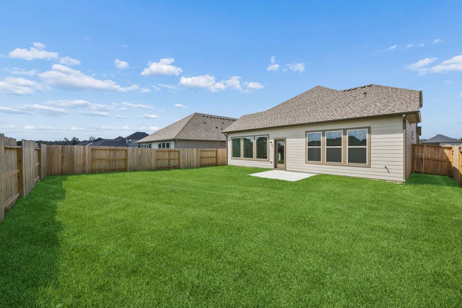 Exterior details and patio area of a home in Riviera Pines, Huffman (Image 21).