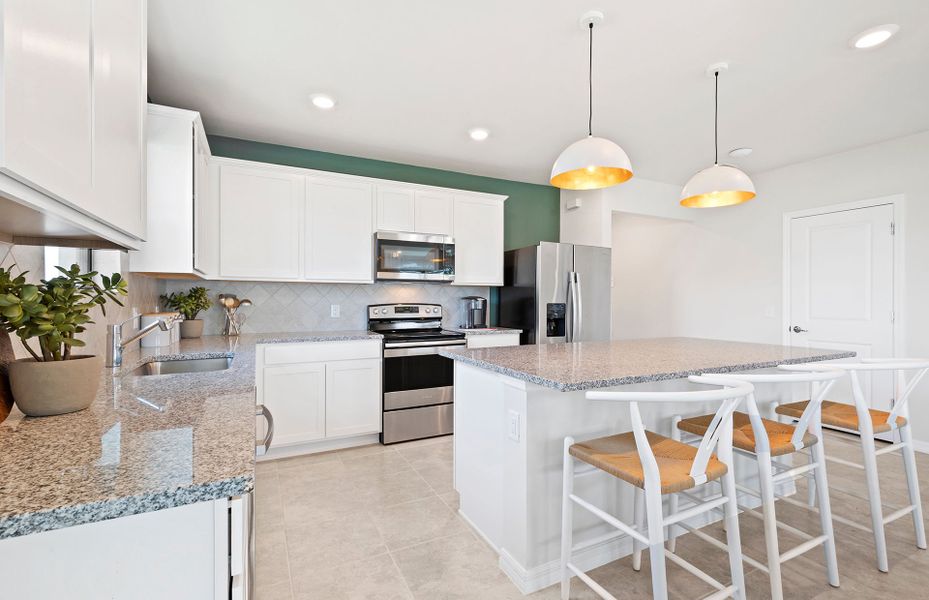 Furnished interior view inside a new home in Whispering Lakes, Lehigh Acres (Image 38).