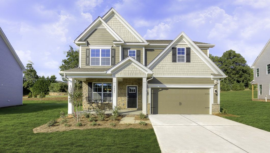 Front exterior of a new home in Sanctuary at Southgate, Indian Trail, NC, highlighting curb appeal (Image 1). Front exterior of a new home in Sanctuary at Southgate, Indian Trail, NC, highlighting curb appeal (Image 1).