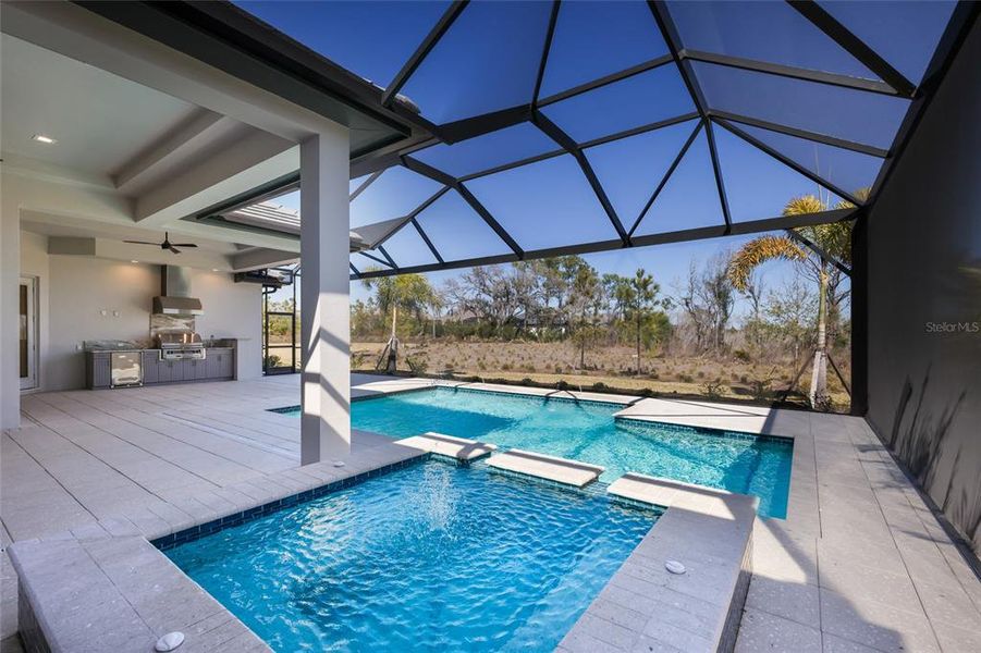 Exterior details and patio area of a home in Wild Blue at Waterside, Sarasota (Image 30). Exterior details and patio area of a home in Wild Blue at Waterside, Sarasota (Image 30).