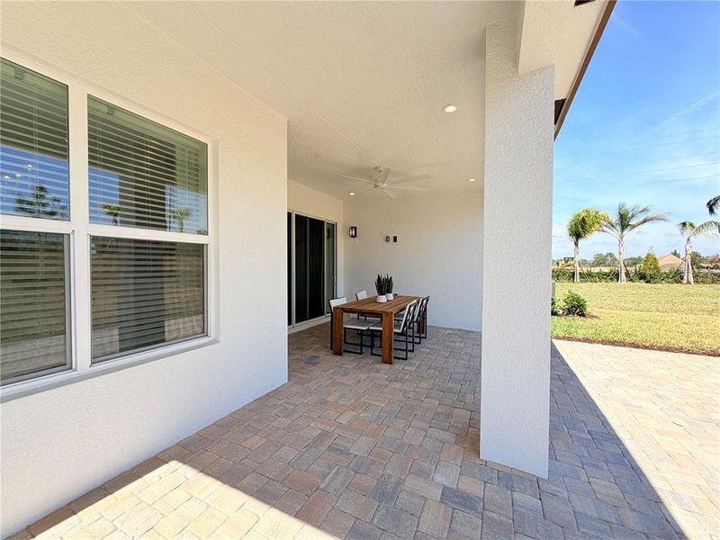 Exterior details and patio area of a home in Valencia Ridge, Wesley Chapel (Image 3).