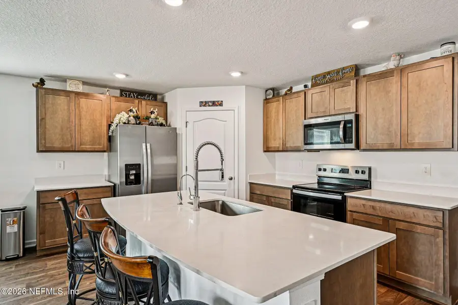 Furnished interior view inside a new home in Cross Creek Express, Green Cove Springs (Image 9).
