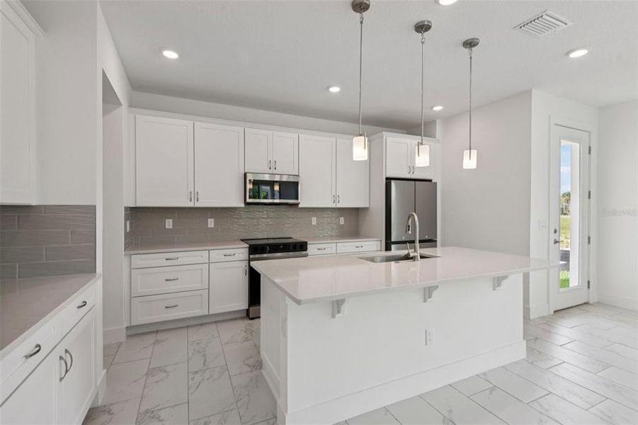 Furnished interior view inside a new home in Lagoon Residences at Epperson, Wesley Chapel (Image 4).