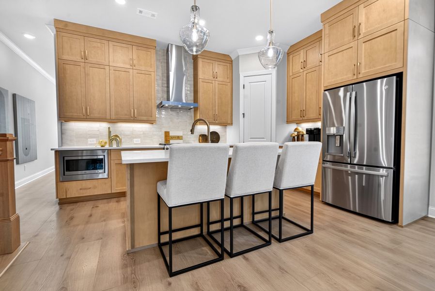 Representative furnished interior of a home built from the The Benton IV by The Providence Group in Ward's Crossing Townhomes, Johns Creek (Image 18).