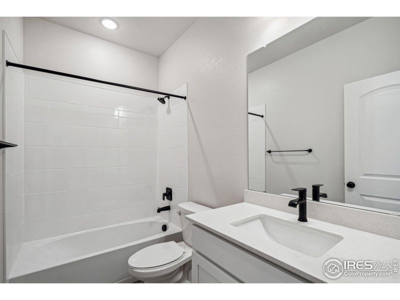 Furnished interior view inside a new home in Kinston Mainstreet Townhomes, Loveland (Image 12).