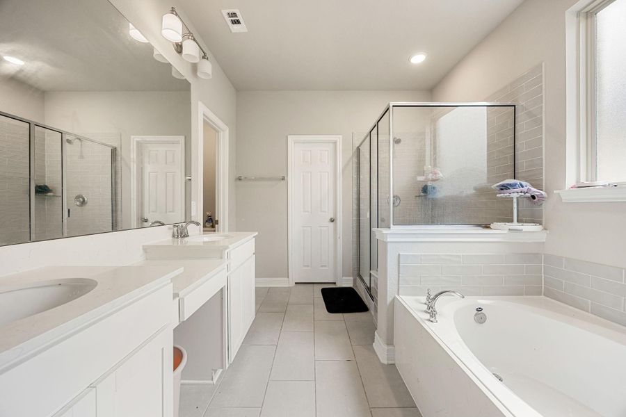 Furnished interior view inside a new home in Sunterra 60ft, Katy (Image 15).
