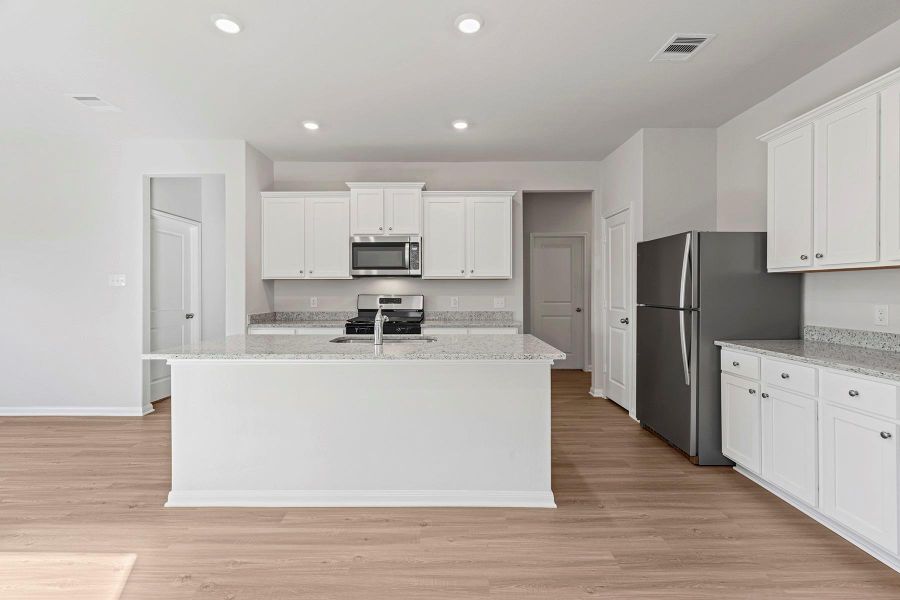 Furnished interior view inside a new home in Emberly, Beasley (Image 7).