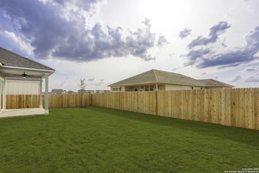 Exterior details and patio area of a home in Weltner Farms 60’s, New Braunfels (Image 2).