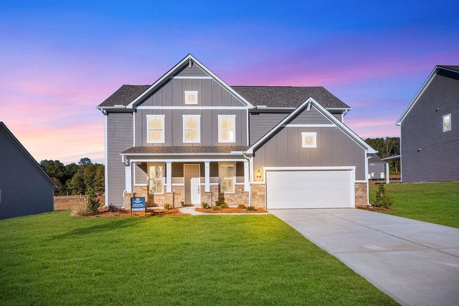 Front exterior of a new home in Pickens Bluff, Hiram, GA, highlighting curb appeal (Image 1).