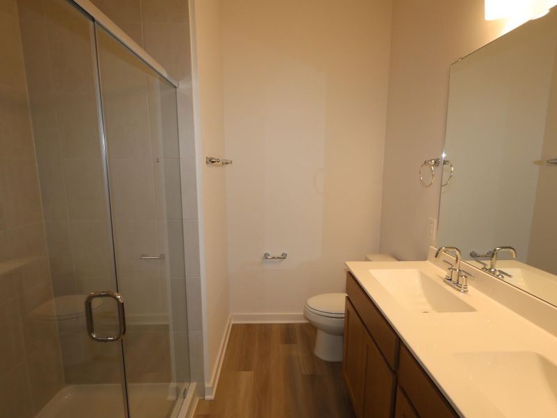 Furnished interior view inside a new home in Pinewood at Grand Texas, New Caney (Image 9).